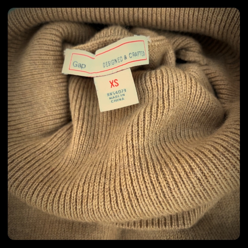 Carmel turtle neck sweater. Looks brand new